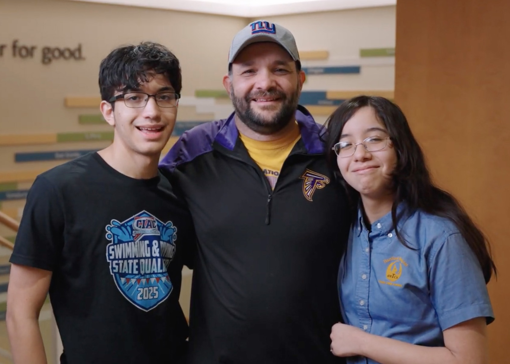 Three people side by side